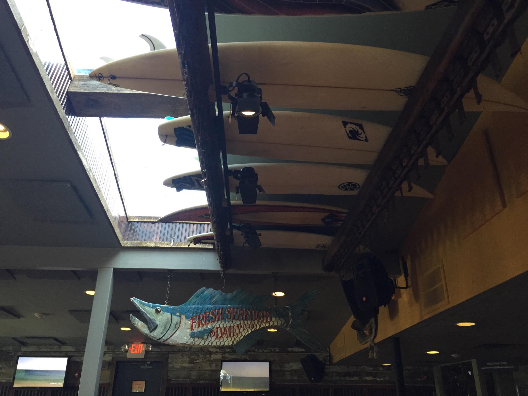Inside The Jetty — surfboards overhead